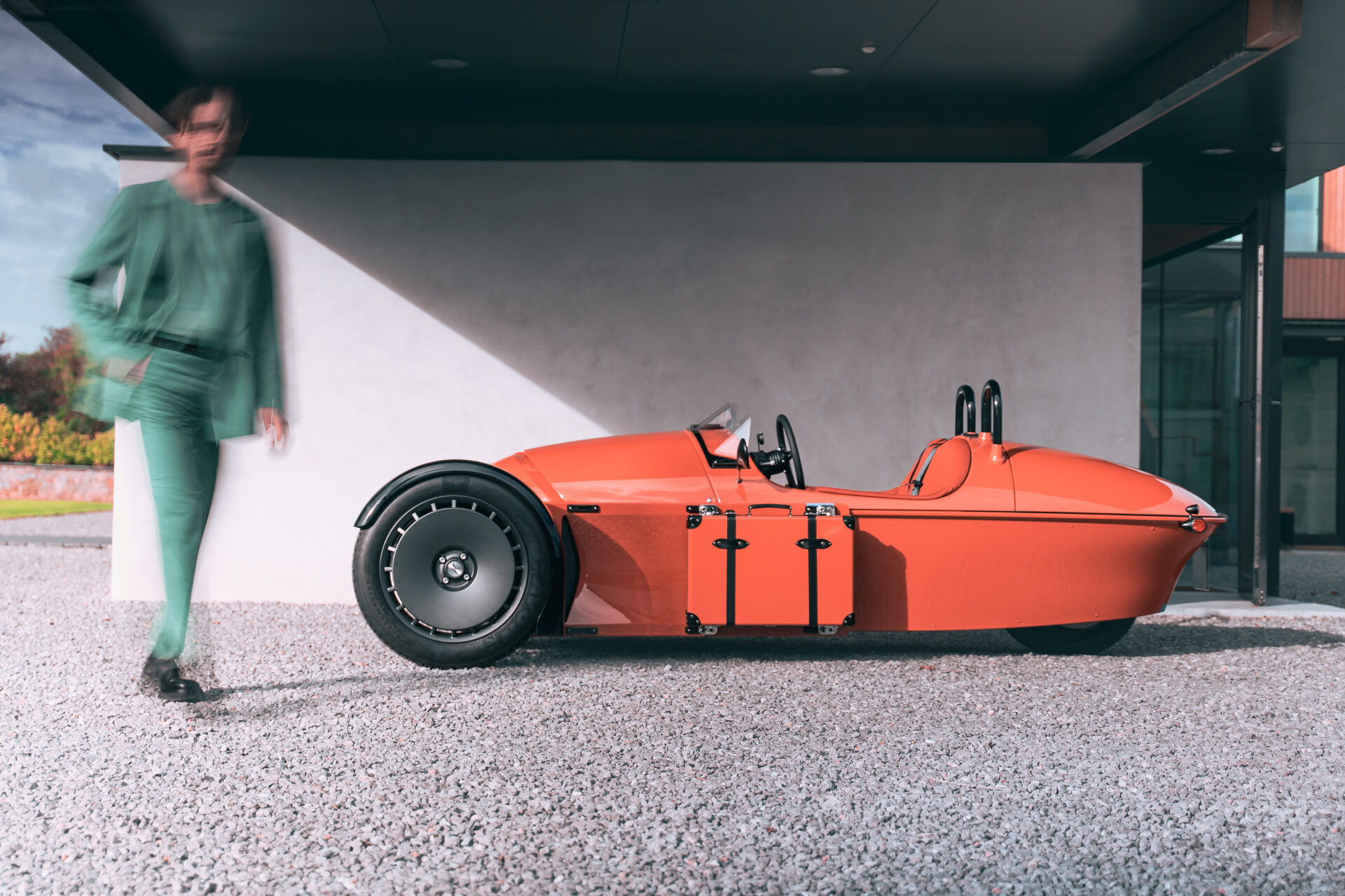 Coral Super 3 parked outside house.