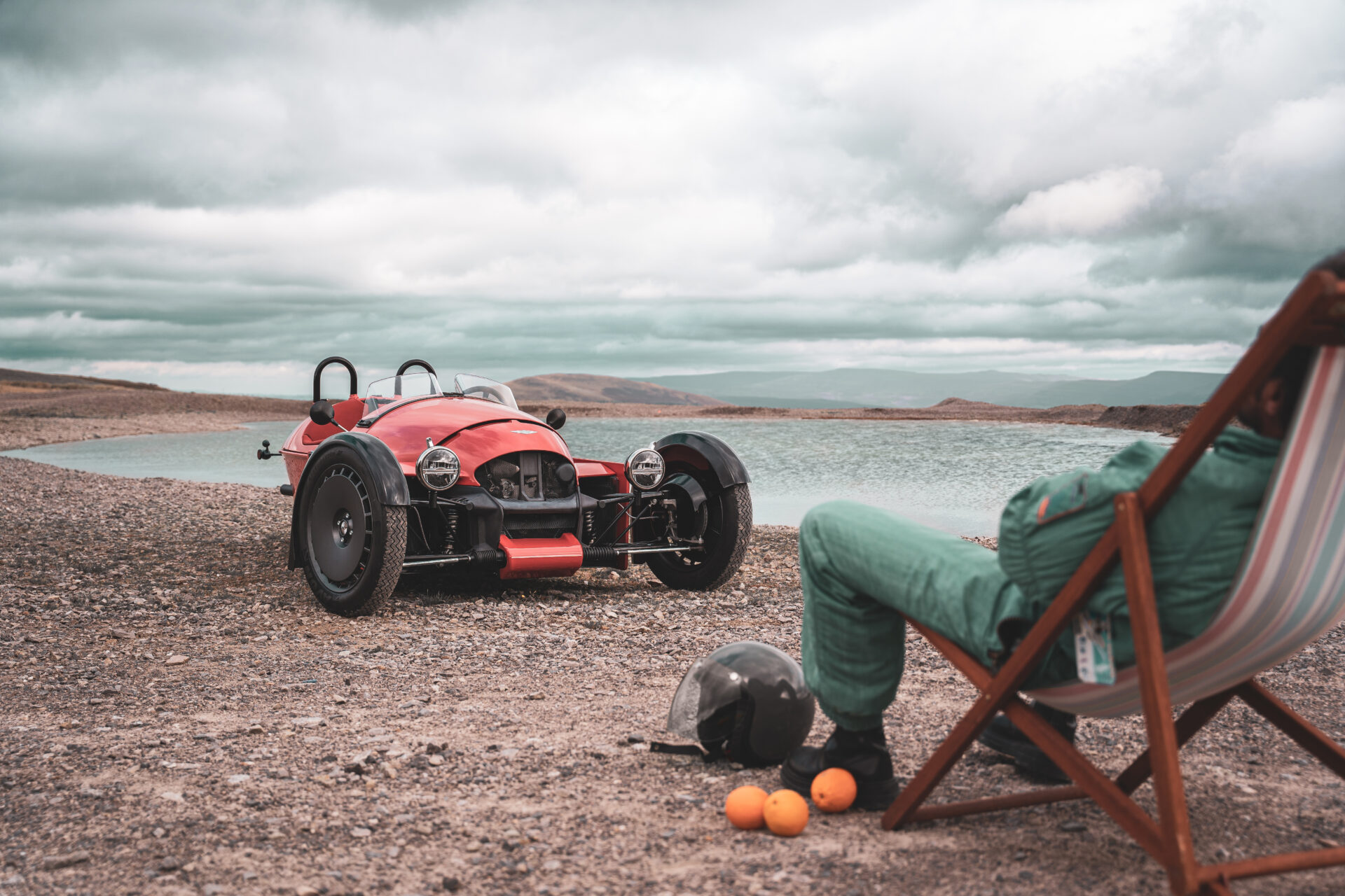 Owner sat enjoying the view on a deck chair in front of their Super 3.